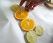 Pastrav la cuptor, pe pat de portocala, lamaie si limeta-7