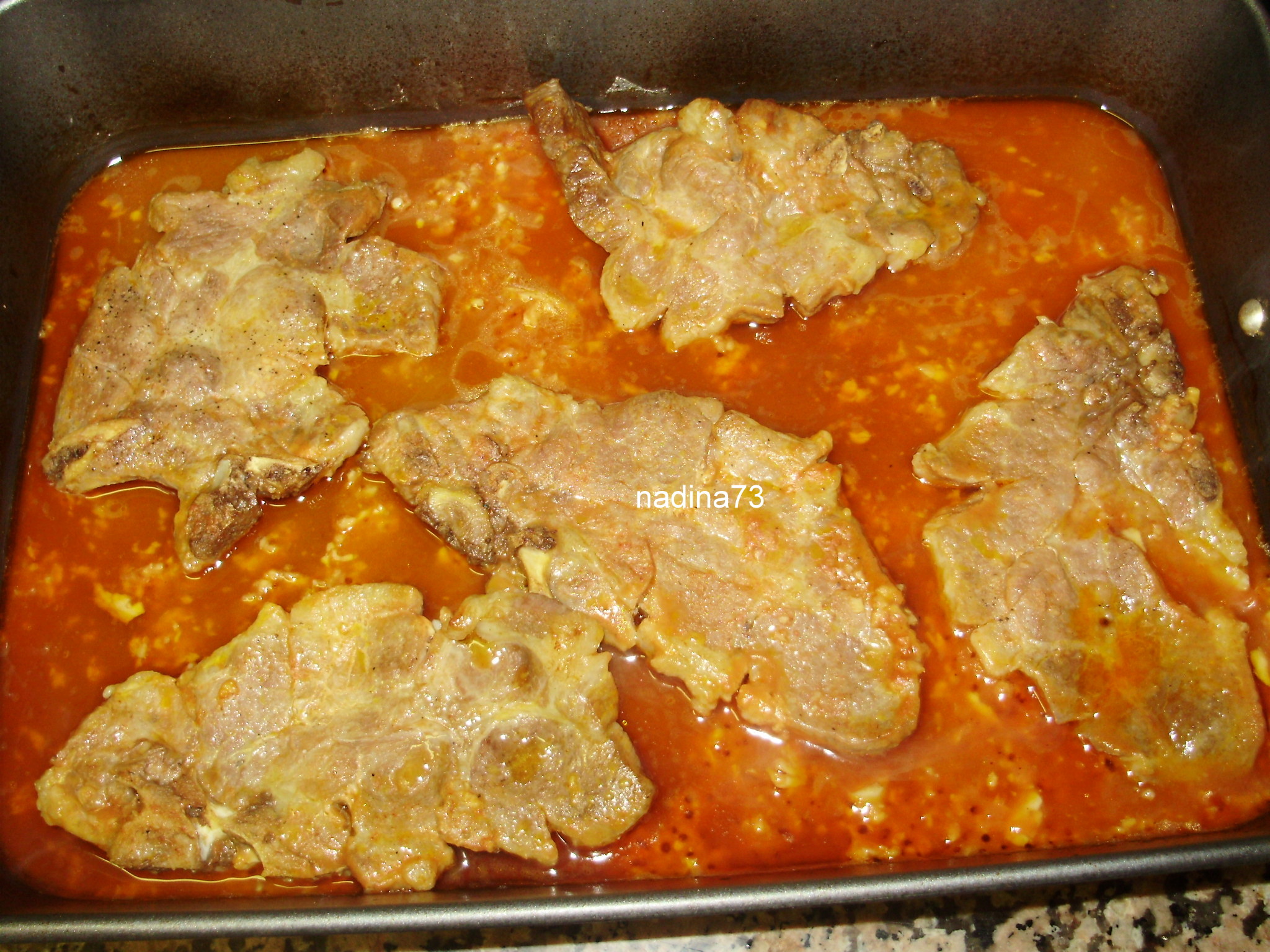 Cotlet de porc aromat cu cartofi la cuptor