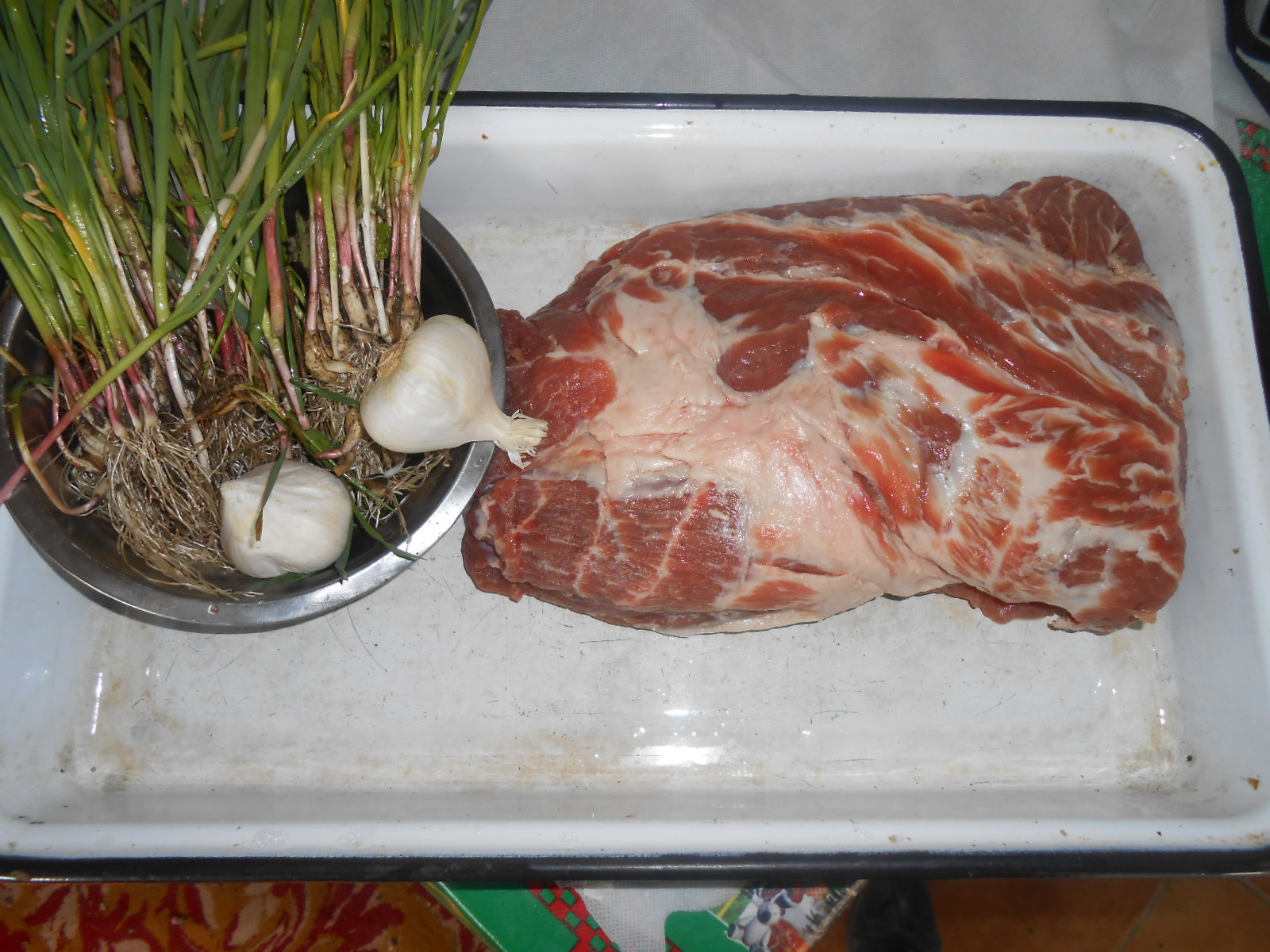 Ceafa de porc la cuptor cu usturoi verde