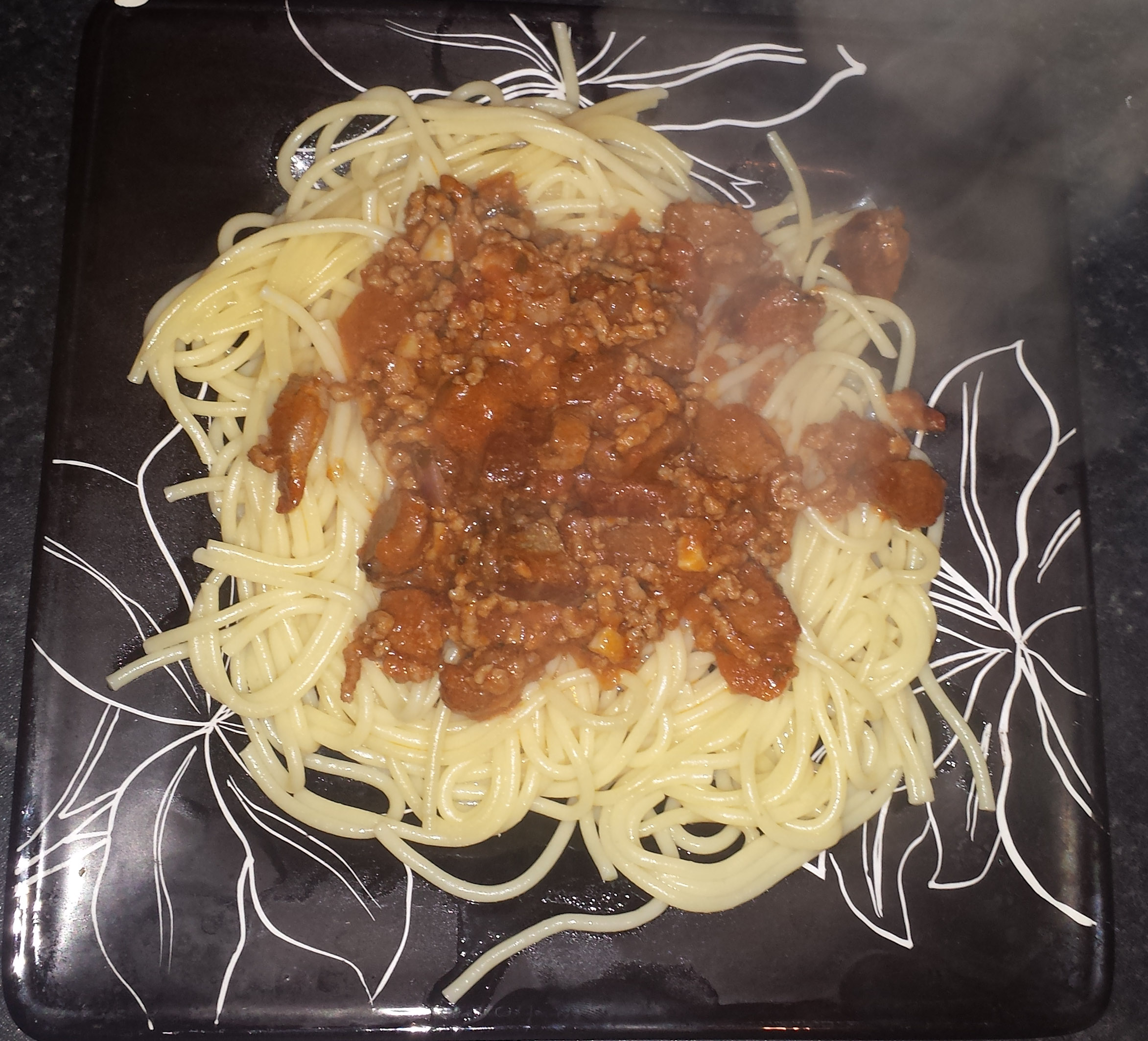 Spaghete cu carne tocata de porc si muschiulet afumat