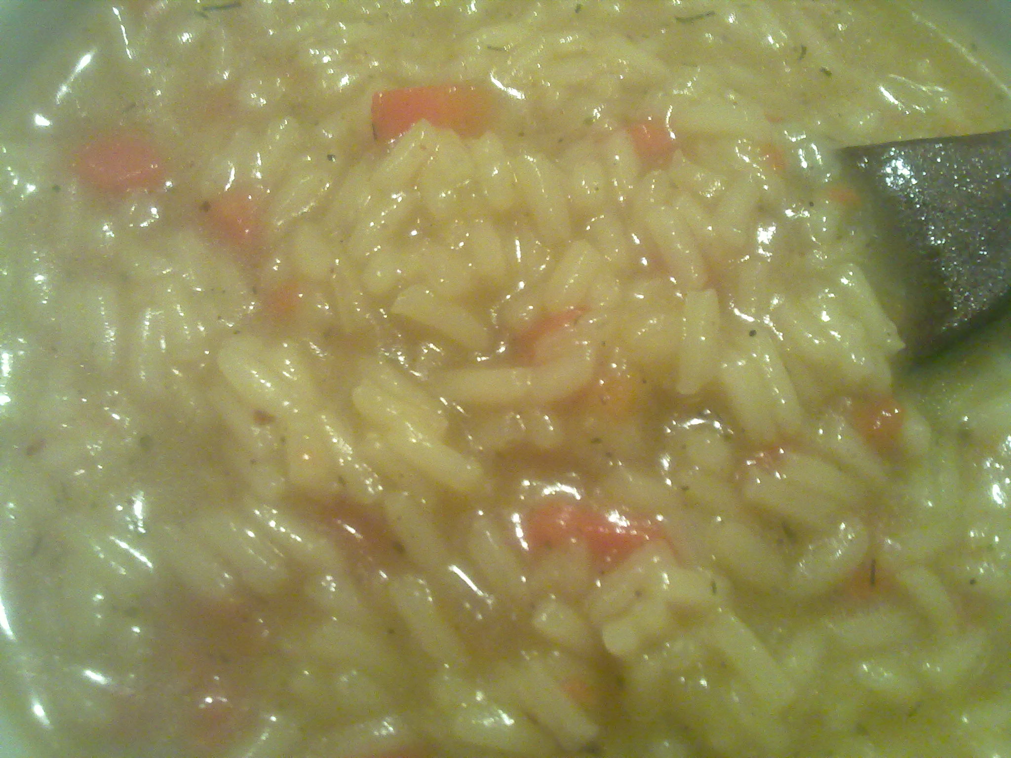 Orez fiert in supa de pui cu legume