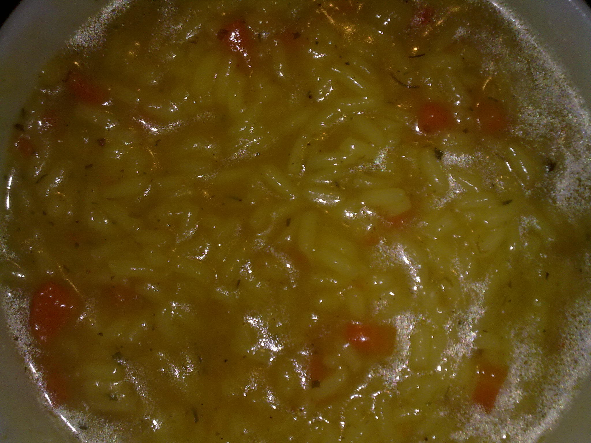 Orez fiert in supa de pui cu legume
