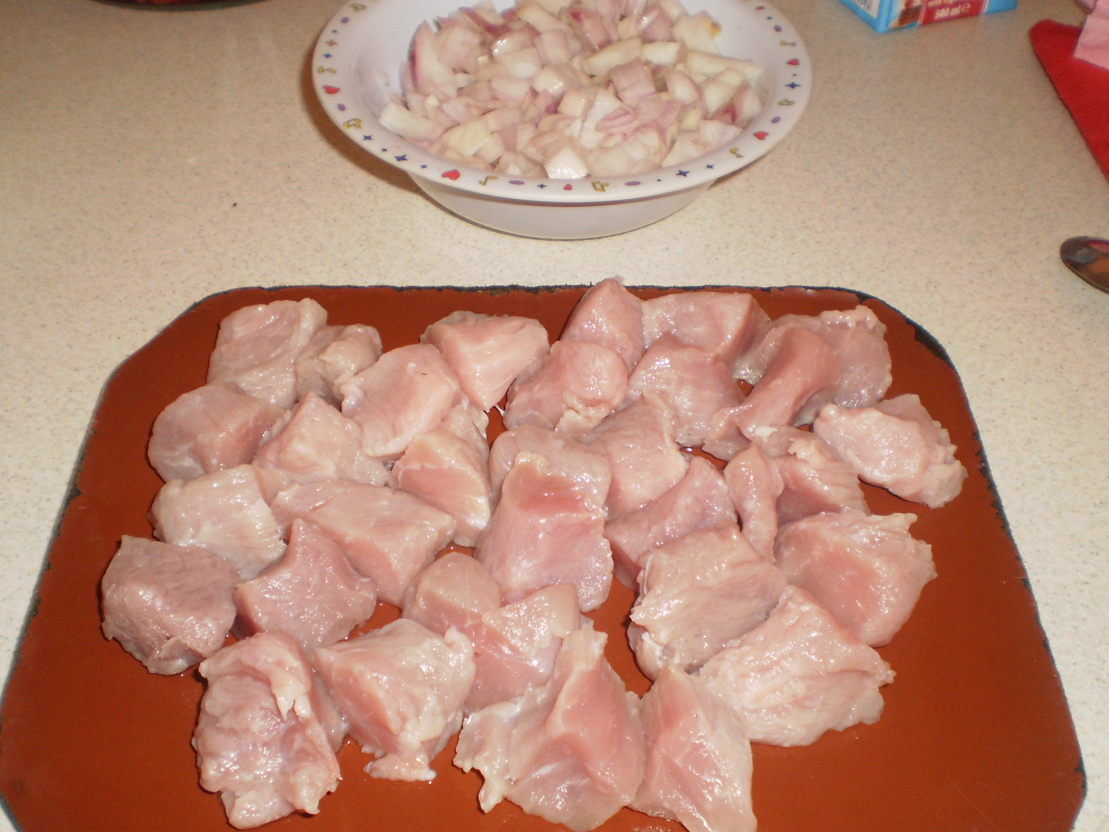 Tocanita de carne de porc cu ciuperci si orez