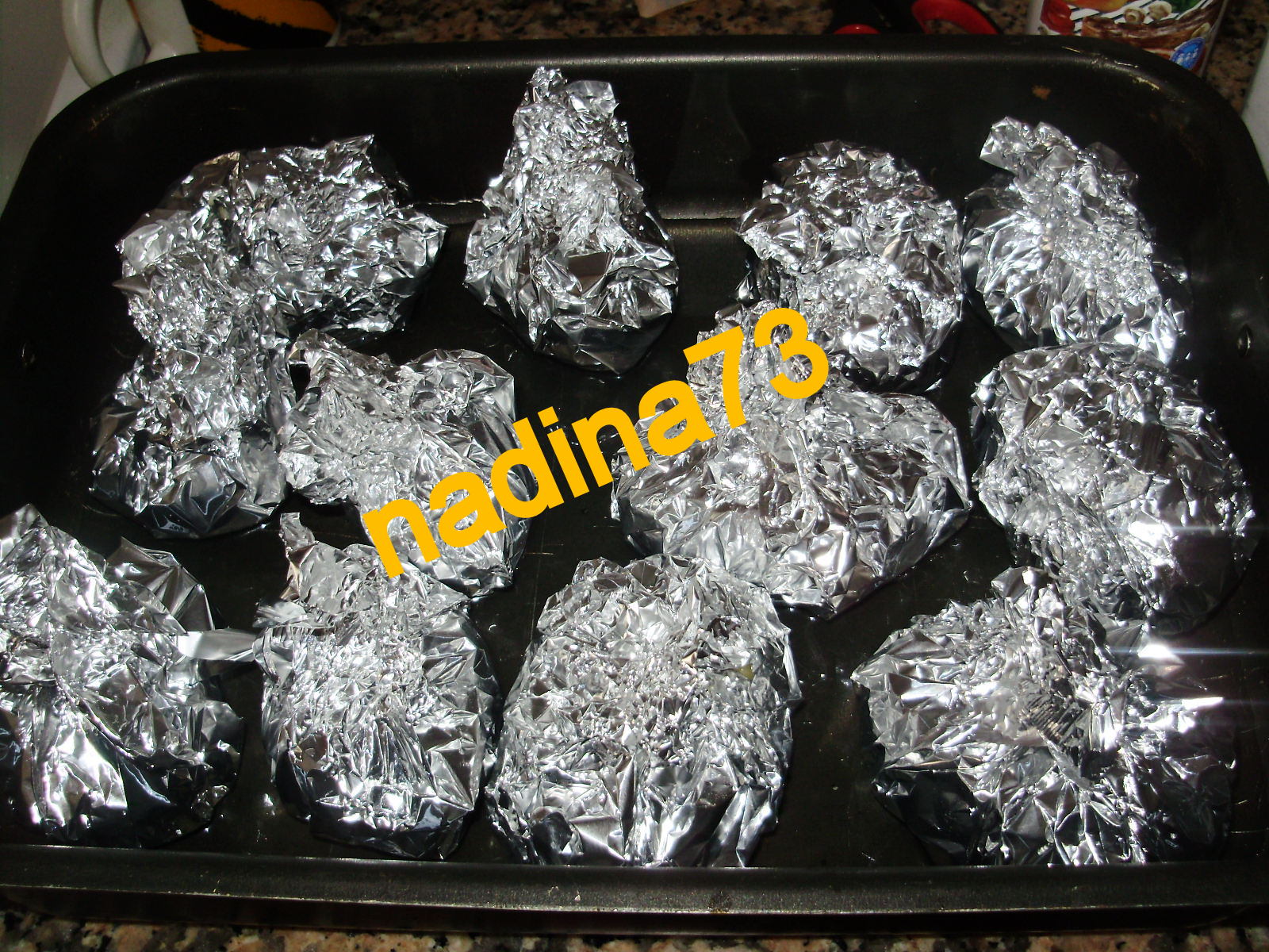 Cartofi in folie de aluminiu la cuptor