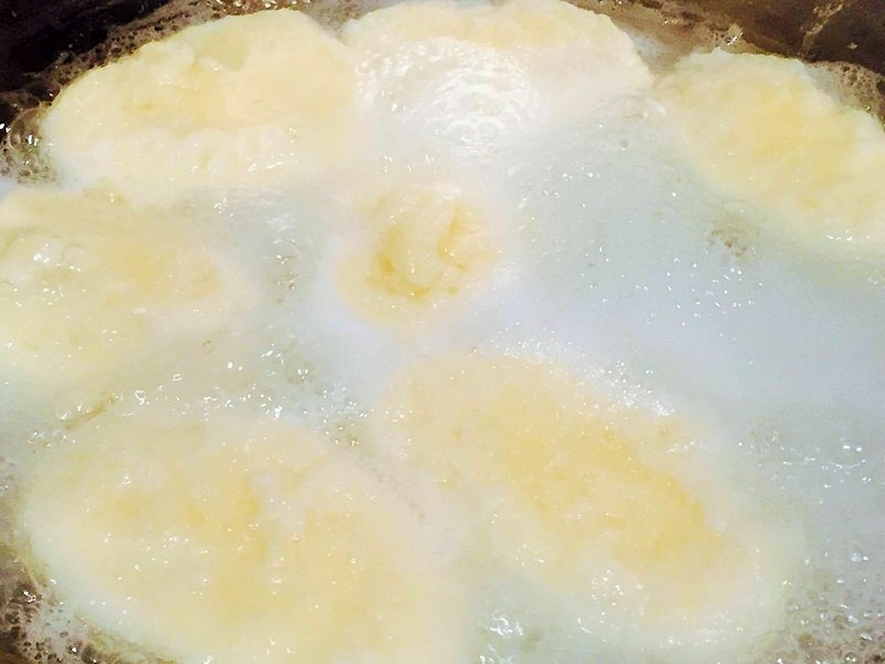 Reteta de preparare a papanasilor cu branza dulce in sos de citrice
