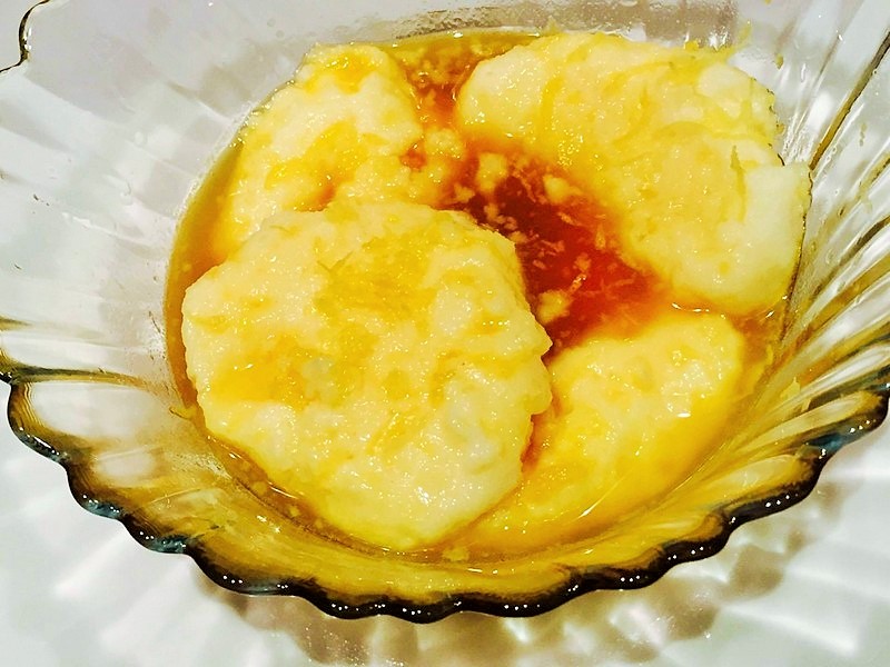 Reteta de preparare a papanasilor cu branza dulce in sos de citrice